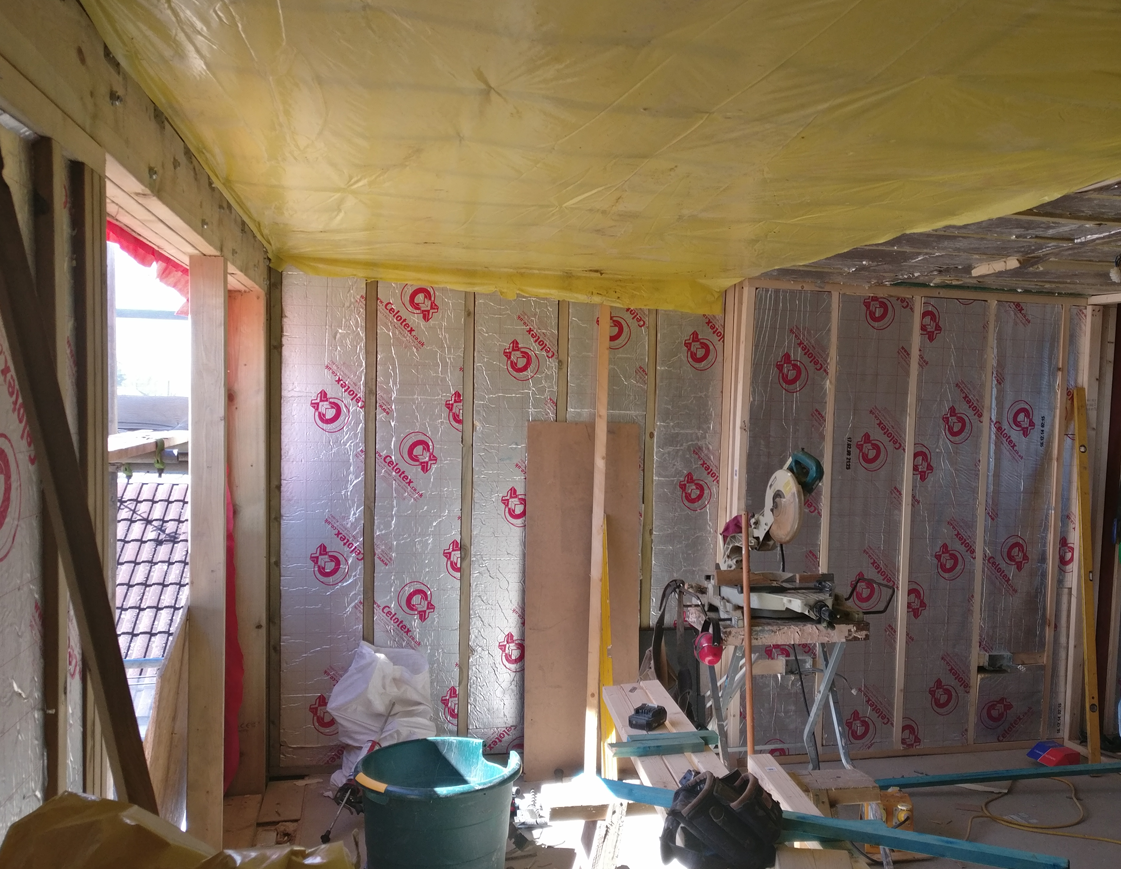 Loft being fully insulated with vapour barrier