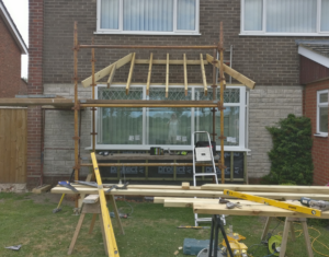 Hand cut double hipped roof