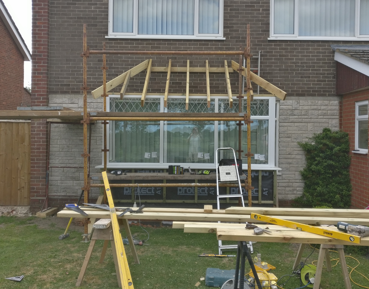 Hand cut double hipped roof