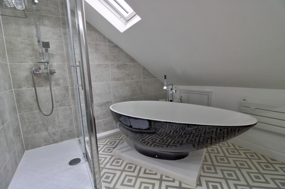 Bathroom fitted with egg shaped bath