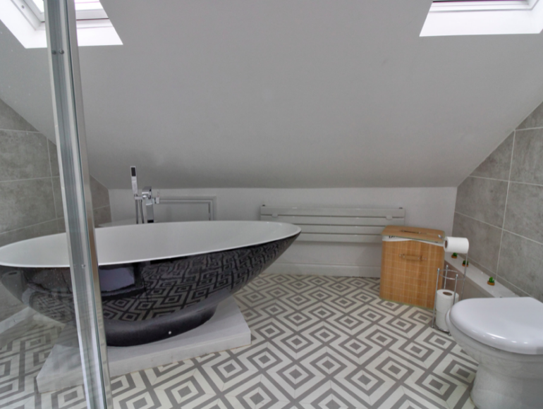 Loft conversion bathroom with velux