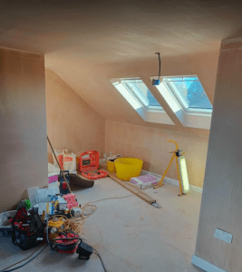 Loft plastered with side by side Keylite windows